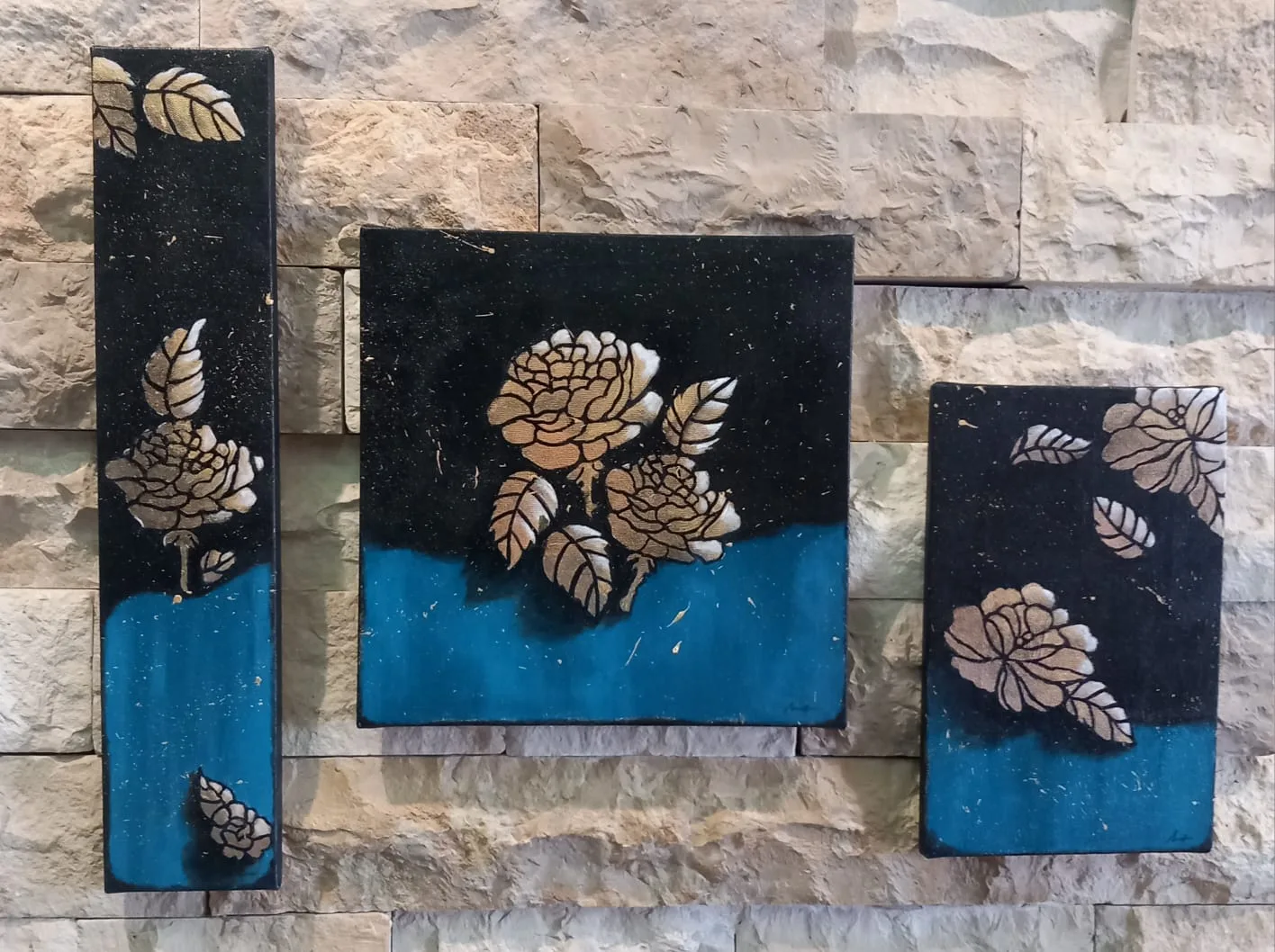 Gold leaves on black and turquoise panels